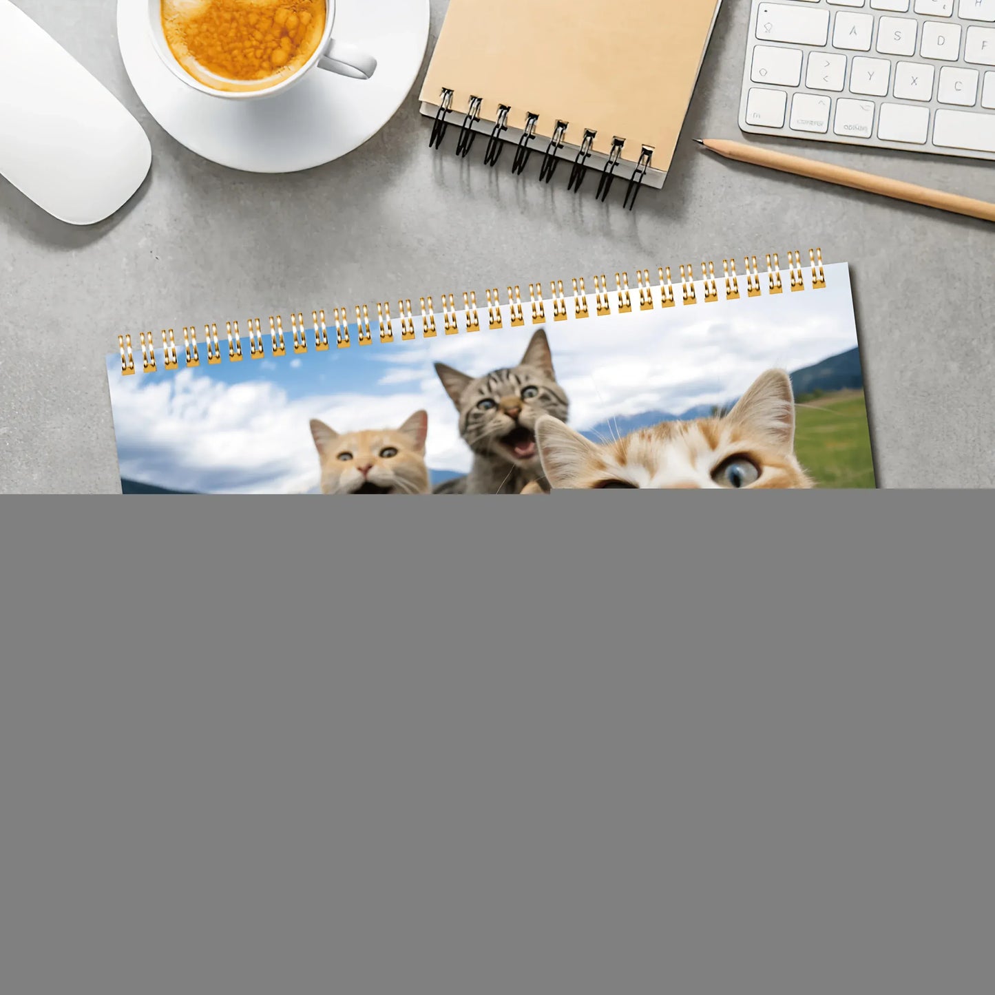 Desk calendar with cat design on a desk with office supplies