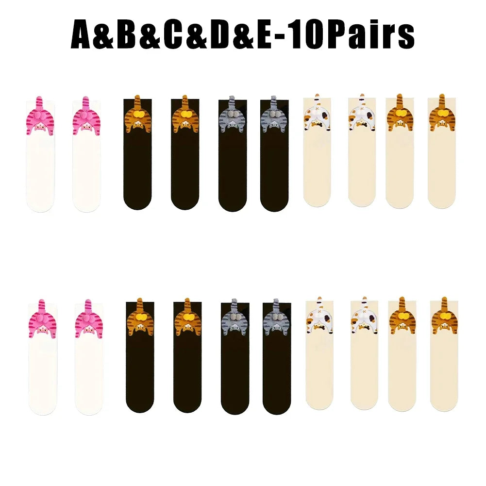 Set of 10 pairs of socks with various designs on a white background