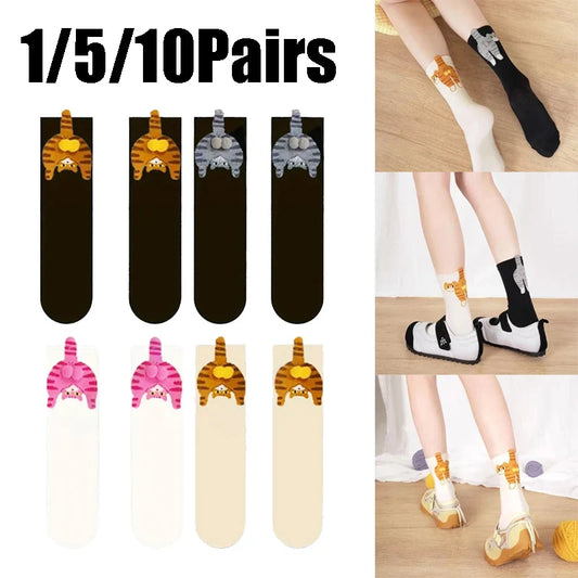 Cat-themed socks with different colors displayed on a white background, with a person wearing the socks in a real-life setting.