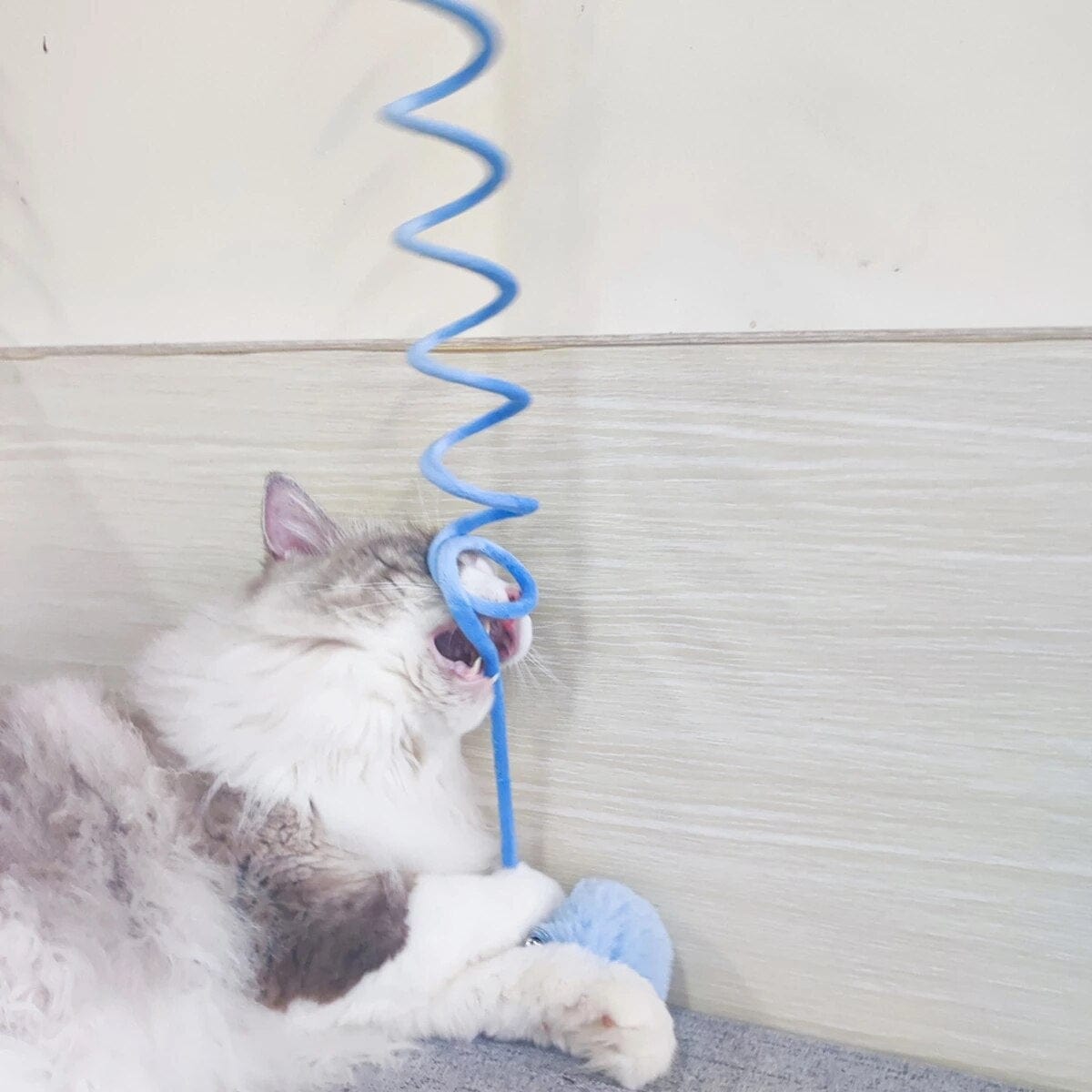 Woolen coil toy for feline play automated cat toy