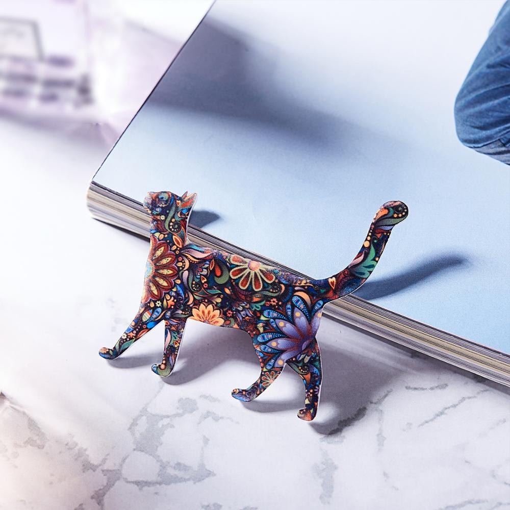 Cat-shaped backpack accessory with a burst of vibrant colors