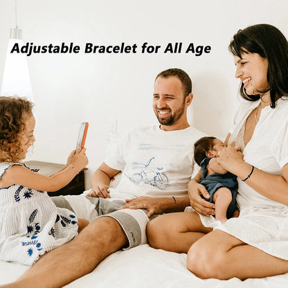 A family of four sitting together on a bed, with a woman holding a baby and a child taking a photo with a phone. The text overlay at the top reads 'Adjustable Bracelet for All Age'.