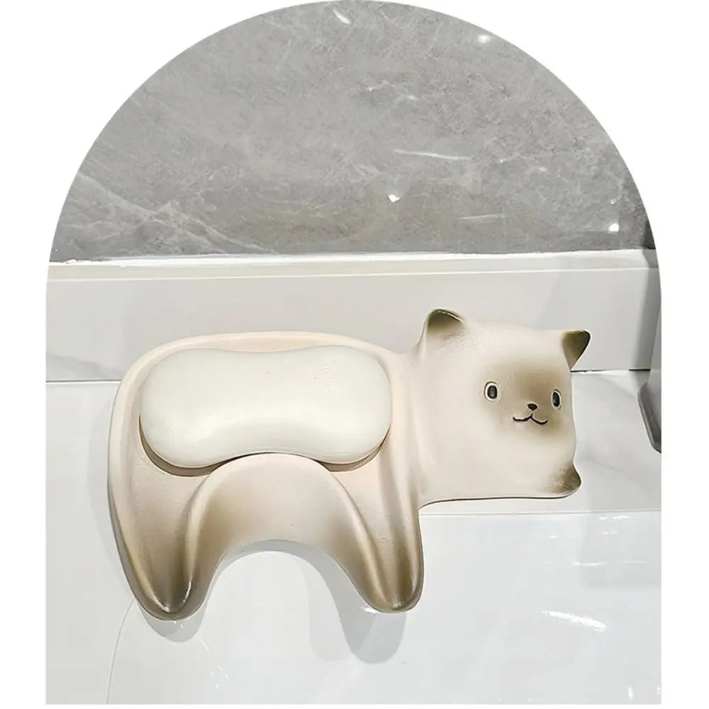 Cat-shaped wall hook on a marble surface