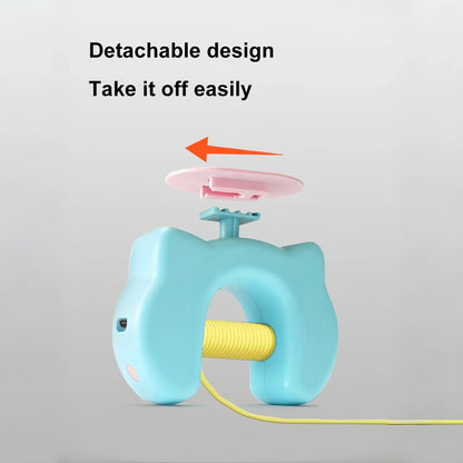 Blue and yellow device with detachable pink component on a gray background
