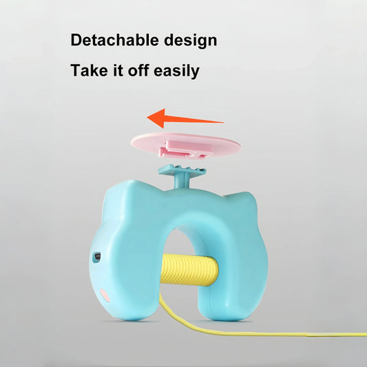 Blue and yellow device with detachable pink component on a gray background