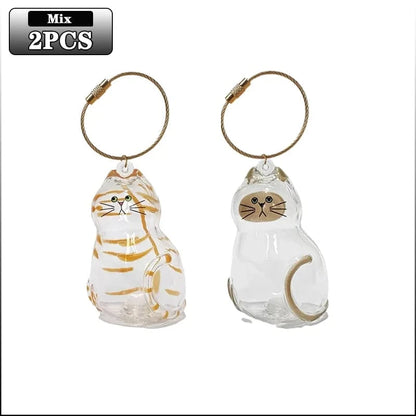 Two cat-shaped keychains on a white background with 'Mix 2PCS' text above.