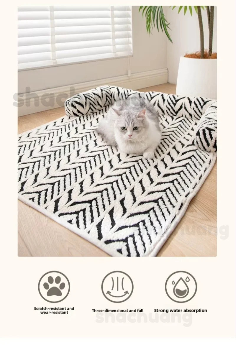 Cat lying on a black and white patterned rug with product features displayed below.