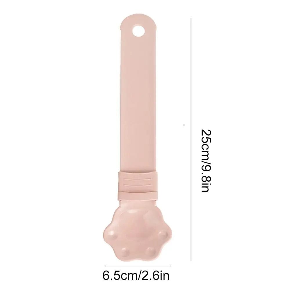 A Cat Strip Squeezer Treat Spoon in pink with its dimensions