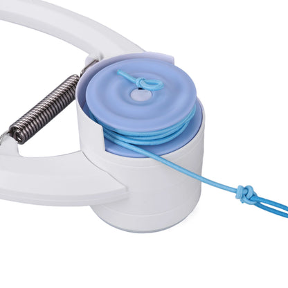 Close-up of a white and blue toy with a spring mechanism on a white background