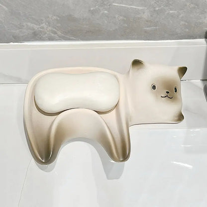 Cat-shaped bath pillow on a bathtub