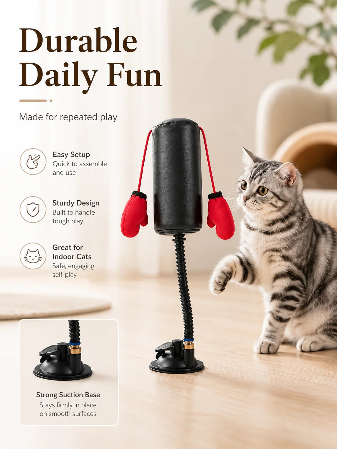 Cat playing with a punching bag toy on a wooden floor.