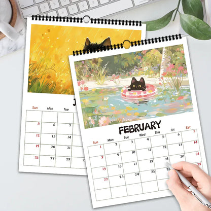 Calendar with cat illustrations on a desk with a pen and coffee cup.