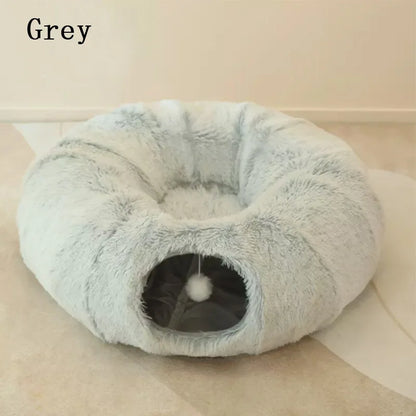 Gray donut-shaped pet bed on a light background