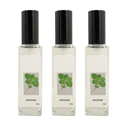 Three Matatabi perfume bottles with black caps on a white background