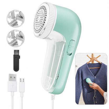 Mint green fabric shaver with attachments on a white background