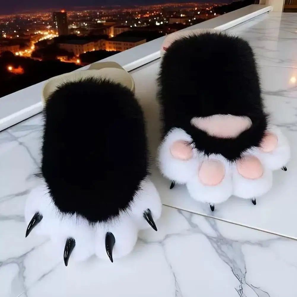 Pair of black and white fluffy gloves on a marble surface with a cityscape background.