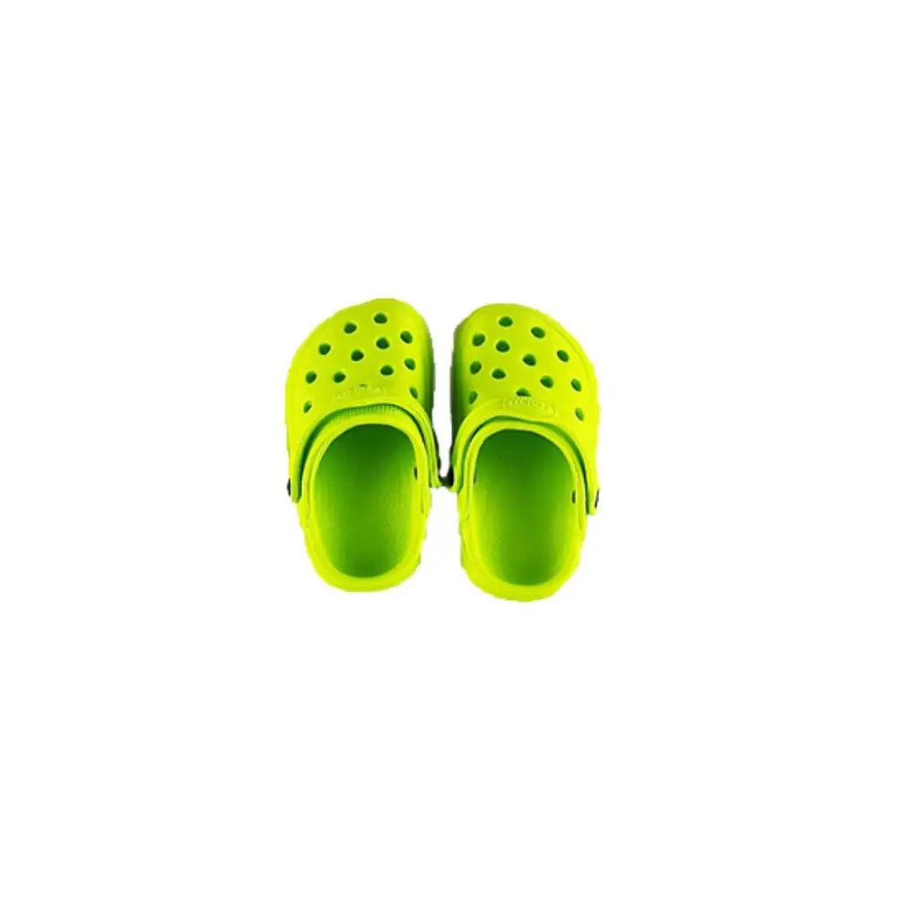 Pair of bright green slippers on a white background