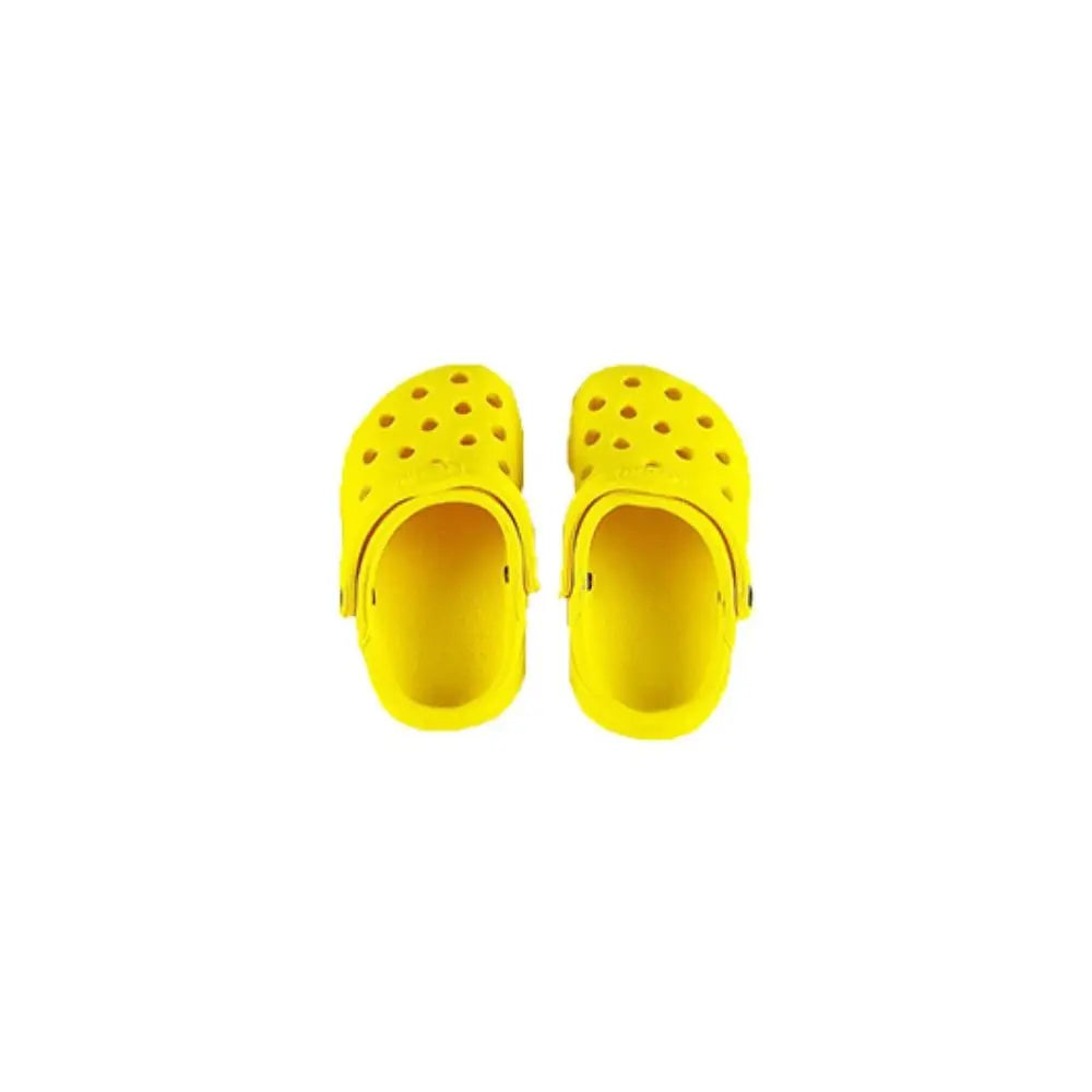 Pair of yellow slippers on a white background