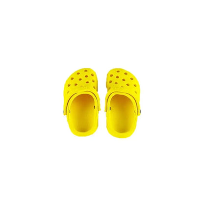 Pair of yellow slippers on a white background