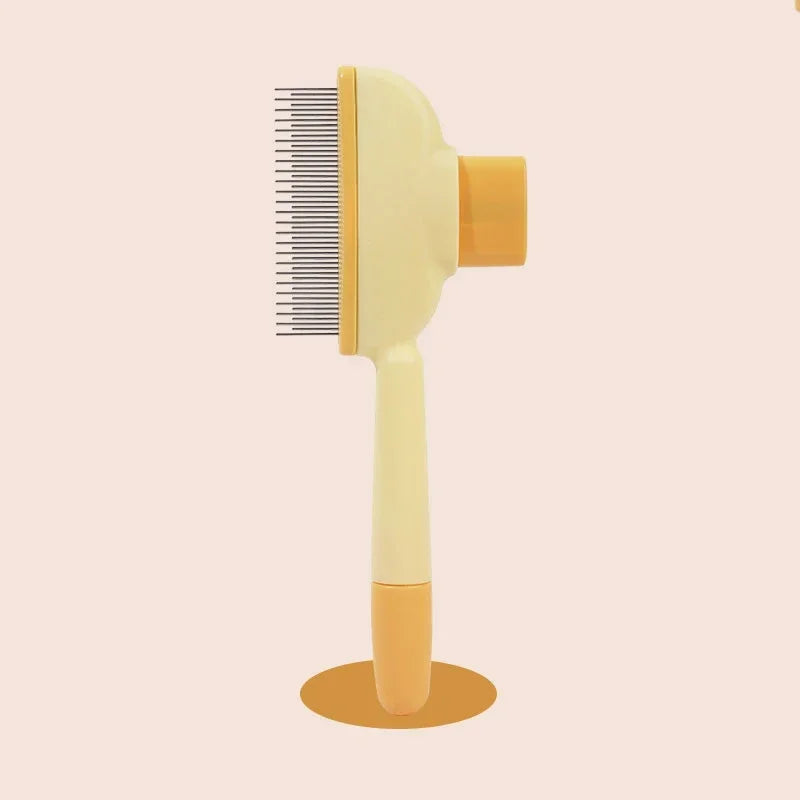 Pet grooming brush with comb on a beige background