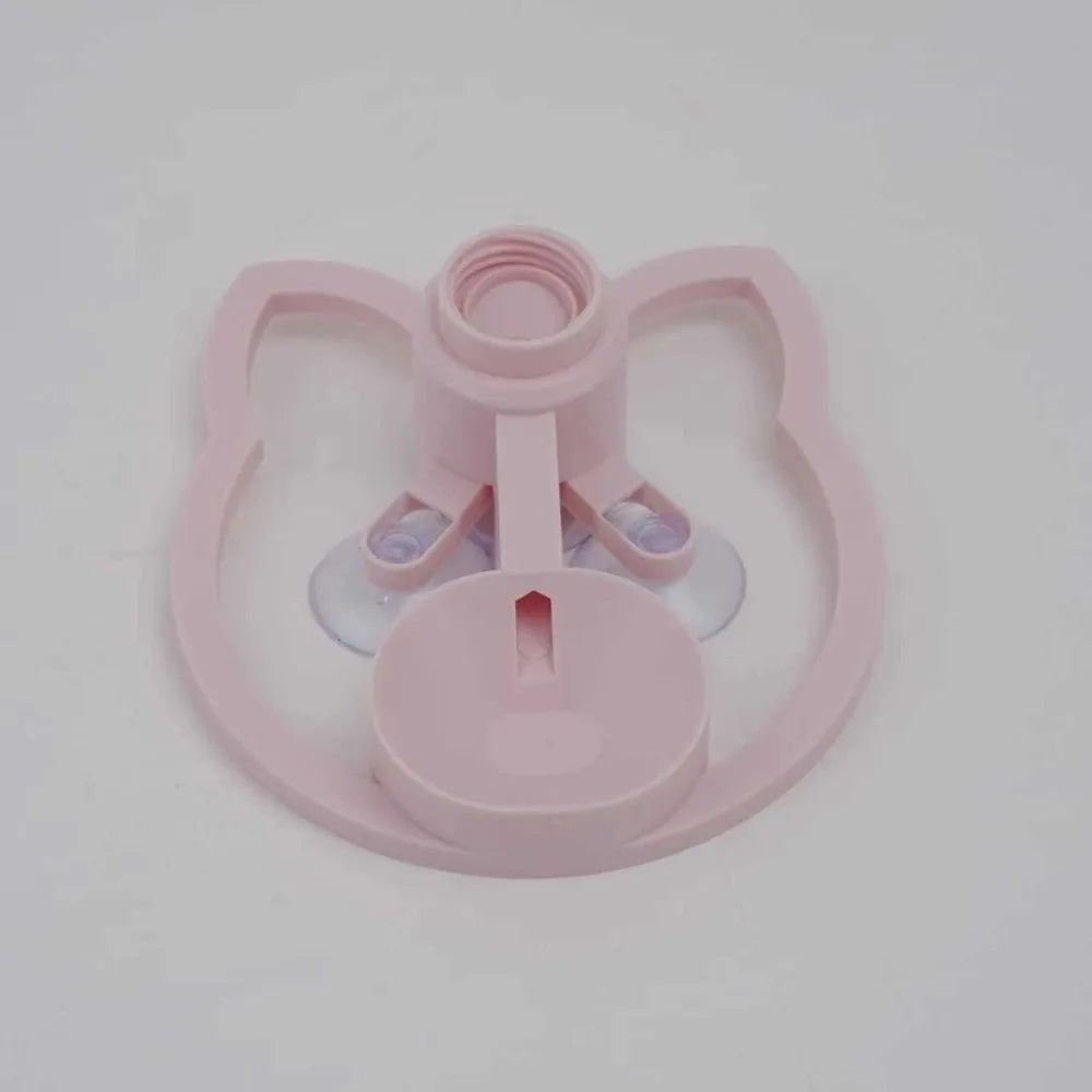 Pink plastic component on a white background