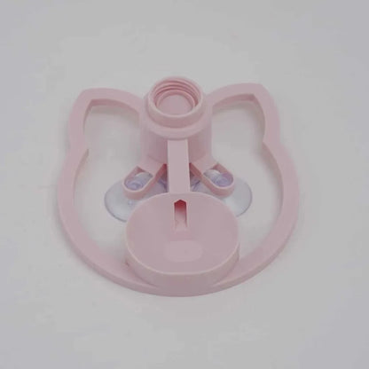 Pink plastic component on a white background