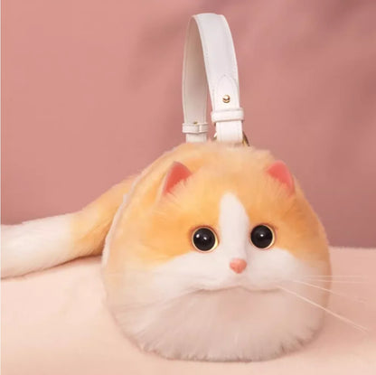 Plush toy bag shaped like a cat with white headphones on a pink background