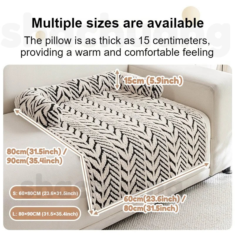 Patterned blanket on a sofa with size measurements displayed