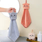 Cat-themed hand towel with a playful feline design