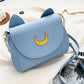 Cross-body purse with Sailor Moon design