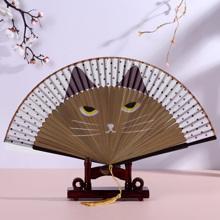 Feline charm in a folding cat handheld fan