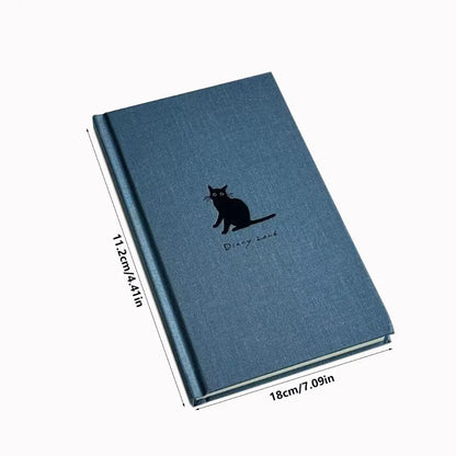 Blue notebook with a black cat illustration and dimensions on a white background