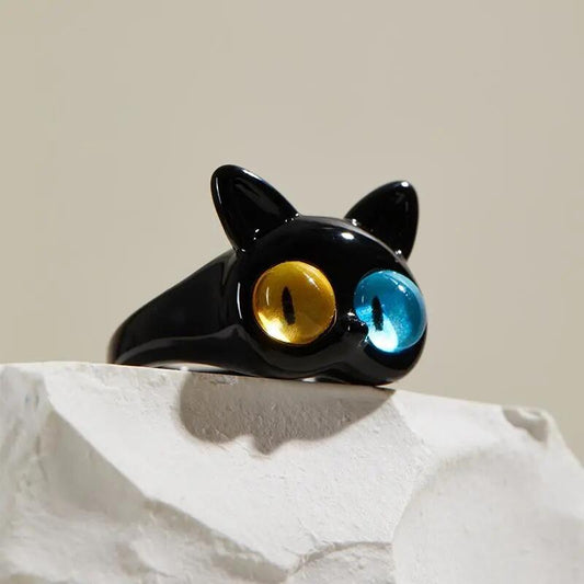 Bold Black Cat Cocktail Ring with Blue and Yellow Eyes Close-Up