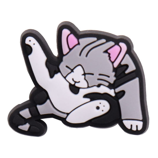 Cats‑on‑Crocs Charm with a Cat Licking Itself 