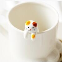 Ceramic Cat Spoon Resting on Mug – Cute Drink Accessory