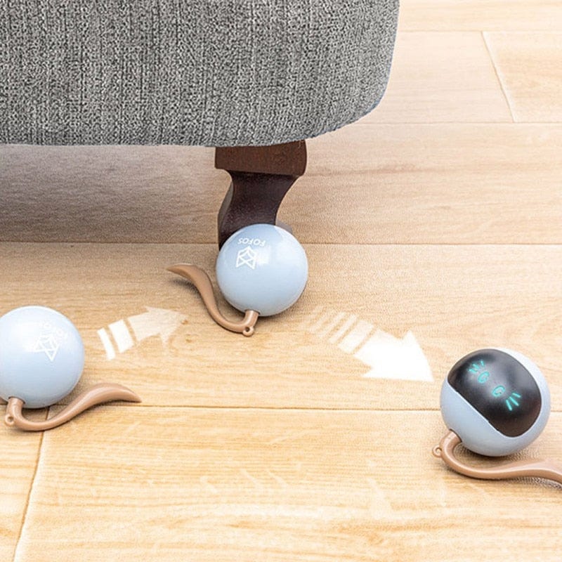 Smart technology integrated into a self-rotating cat ball