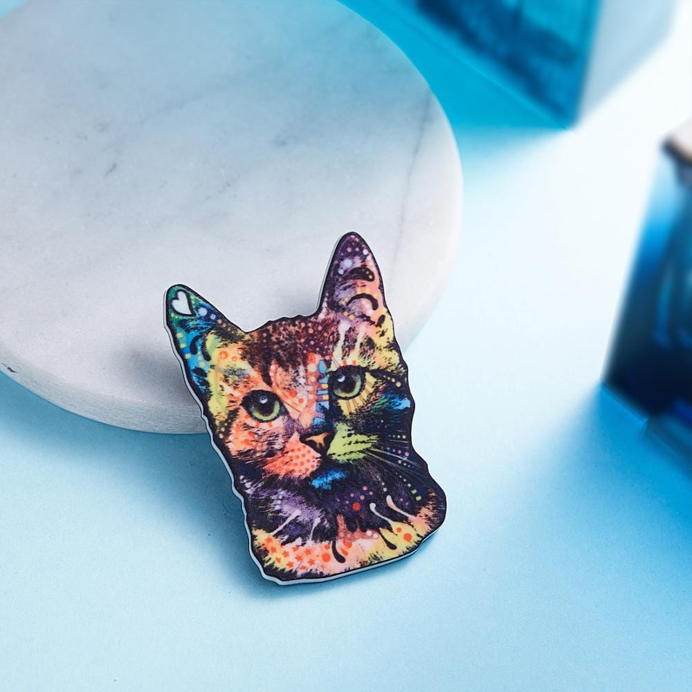 Multicolored flowery cat pin perfect for backpacks