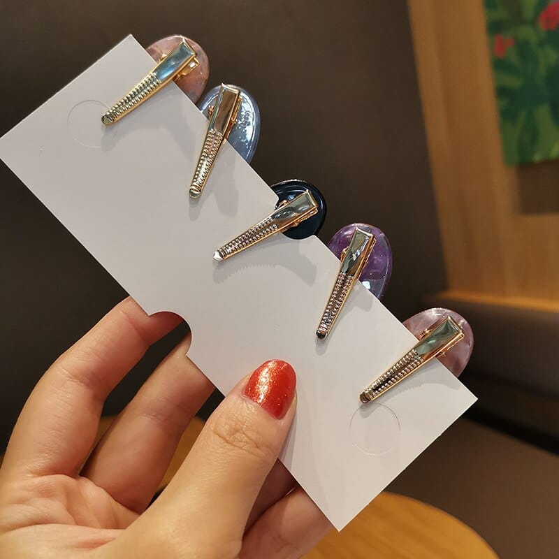 Oval Cat Hair Clips Organized on Display Card