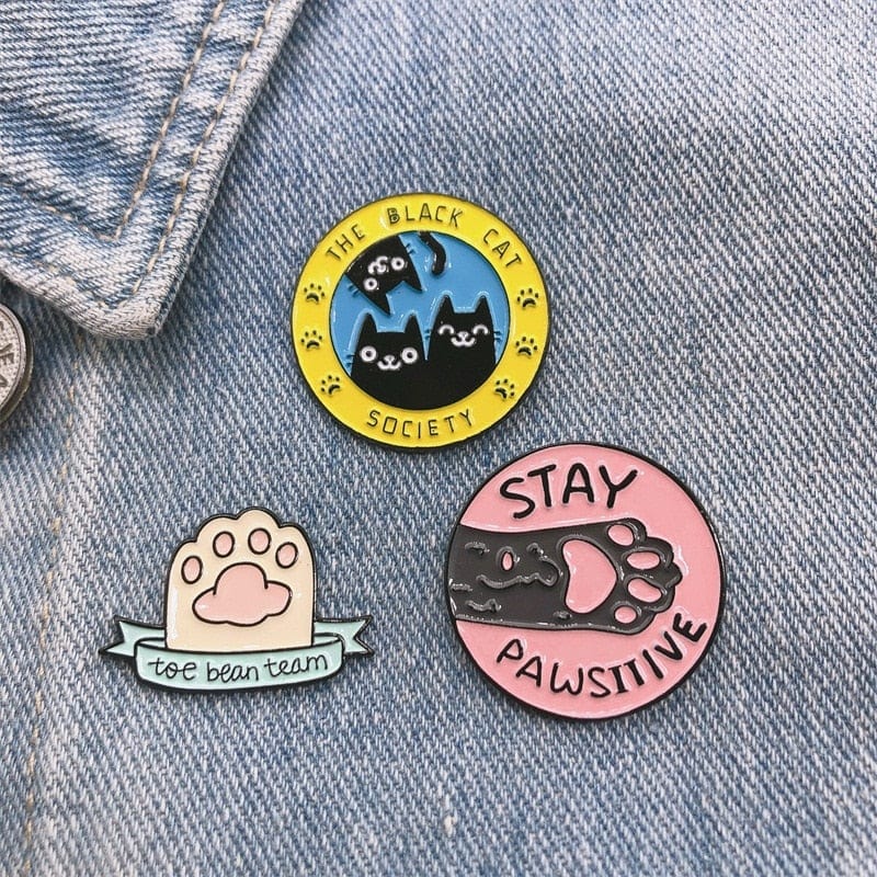 PAWSITIVE Cat Brooch Collection – Inspirational Pins on Denim Jacket