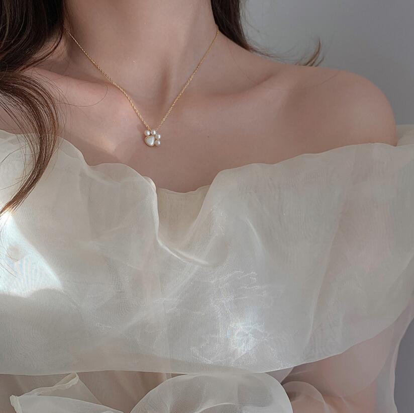 Paw Pearl Necklace Styled for Elegant Occasions