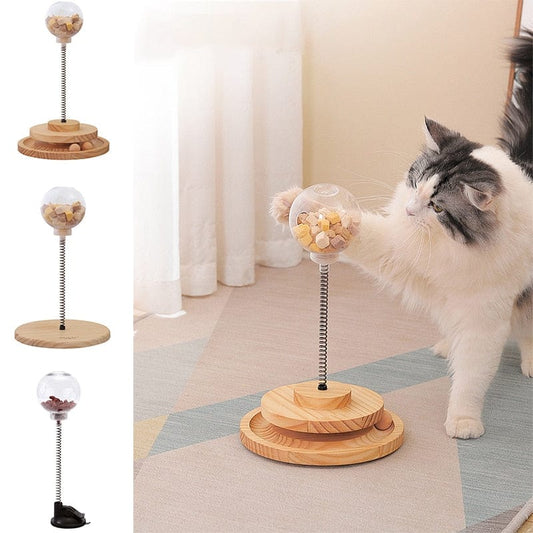 Interactive swinging cat toy feeder