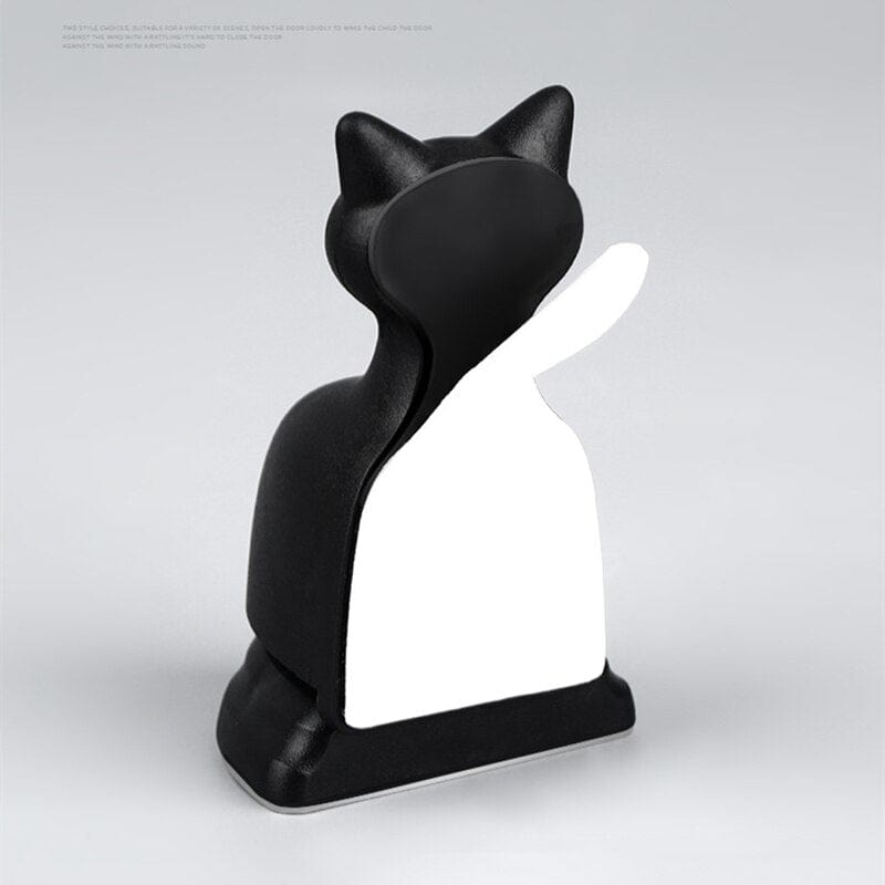 Decorative cat door stop with a whimsical design