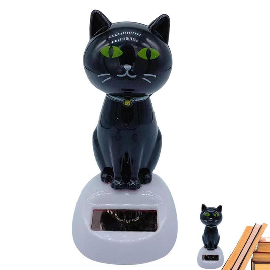 Cat figurine for car dashboard powered by solar energy