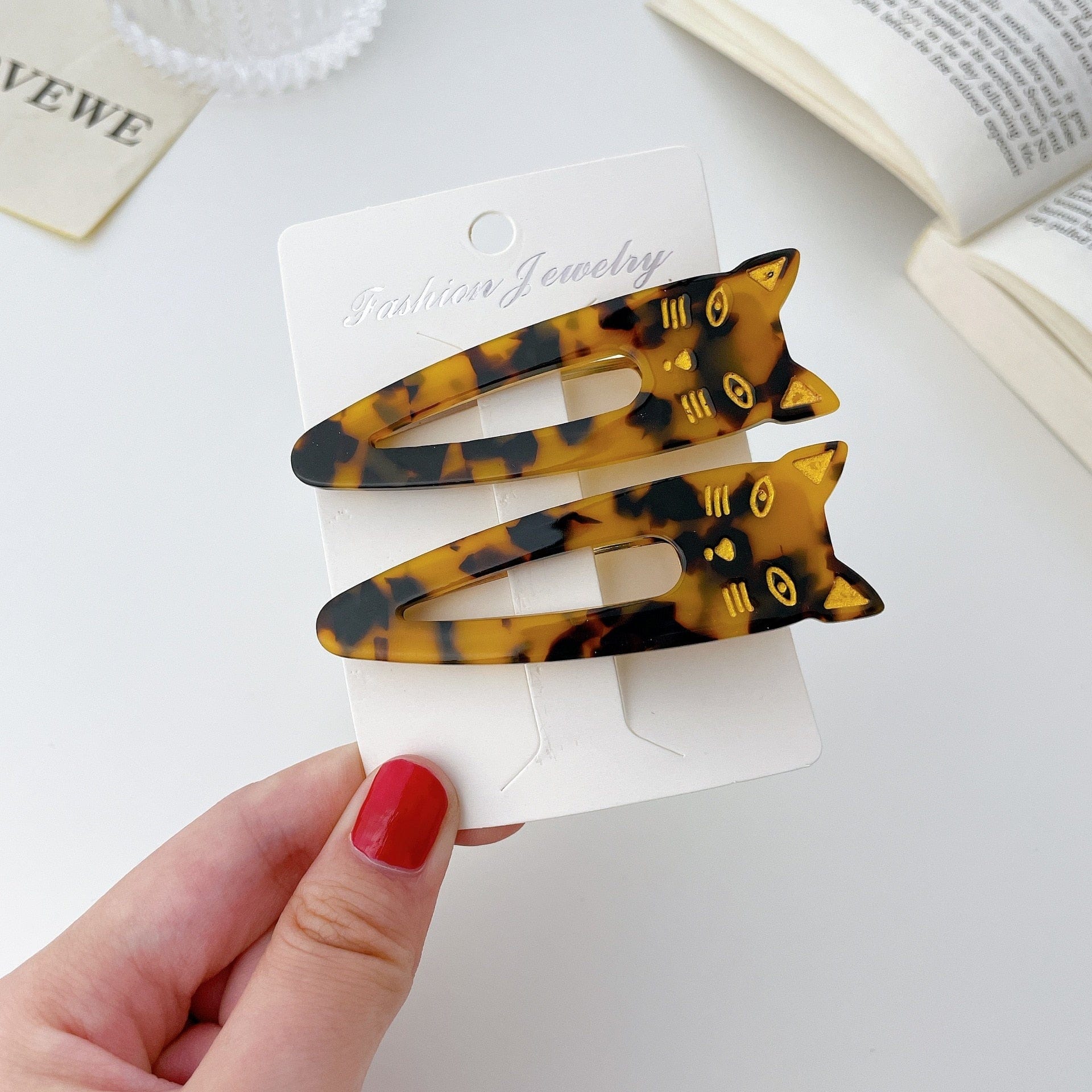 Cat-themed barrettes for girls