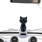 Car dashboard cat figurine with solar power