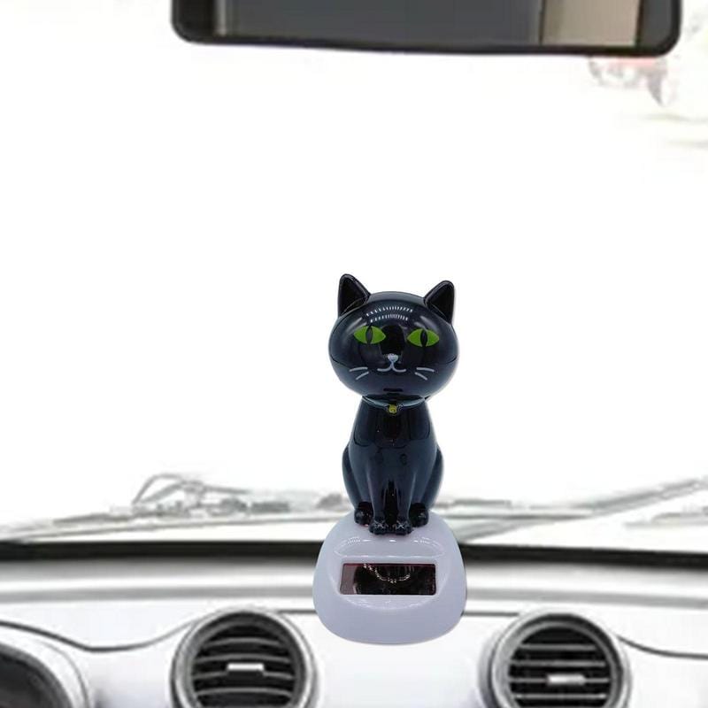 Car dashboard cat figurine with solar power