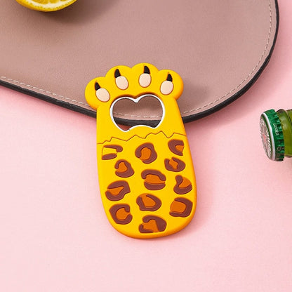 Versatile cat-themed bottle opener with magnetic backing