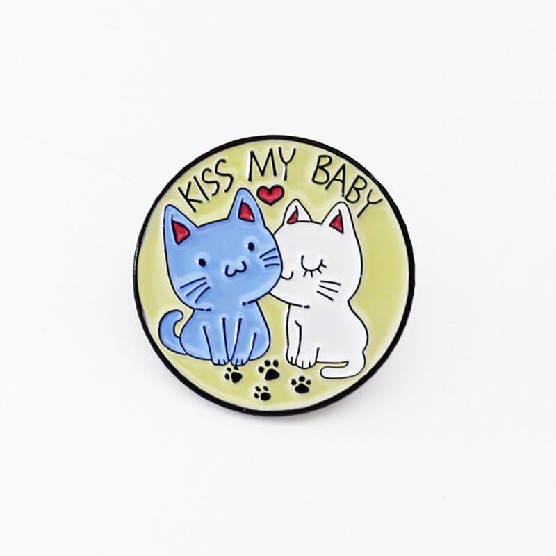 Cat brooches designed to spread a positive message