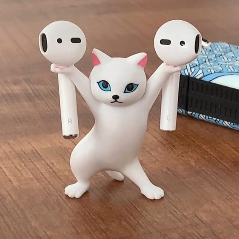 White Cat Dancing Figurine on Desk – Playful Pose