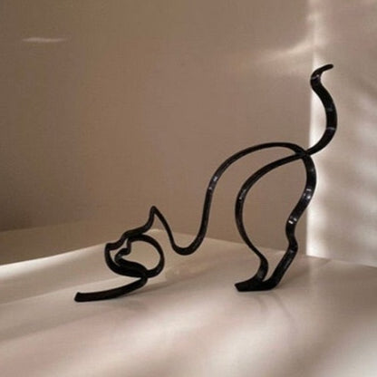 Modern cat home sculpture crafted from metal